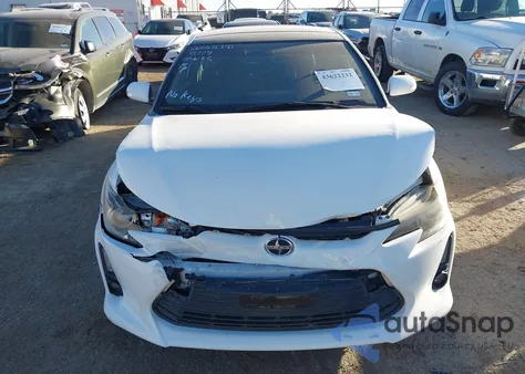2014 Scion Tc Monogram z USA, uszkodzony, nr VIN JTKJF5C76E3084090